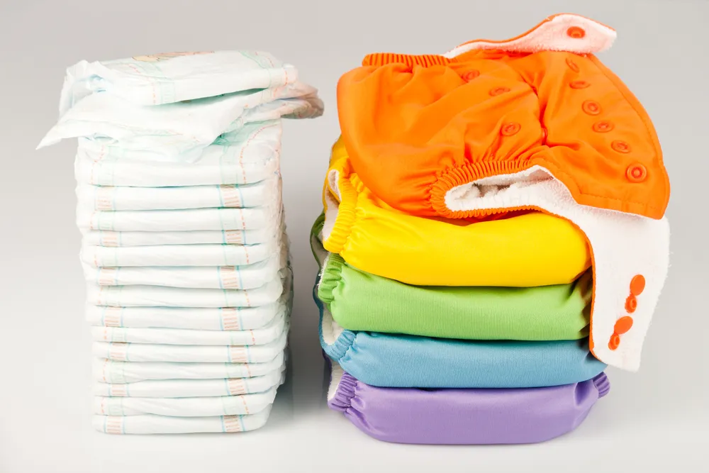 How do “One-Size” cloth diapers fit from birth to potty? Fit Guide and  Pros/Cons – Dirty Diaper Laundry